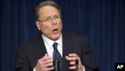 The National Rifle Association executive vice president Wayne LaPierre, gestures during a news conference in response to the Connecticut school shooting, Washington, December 21, 2012. 
