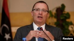 Gaanfa Afrikaatti Jiila Adada Yunaaytid Isteets Jefrii Feeltiman (suuraa faayilii)