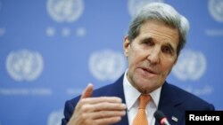 FILE - U.S. Secretary of State John Kerry speaks to the media during a news conference at the United Nations Headquarters in Manhattan, New York, Dec. 18, 2015. 