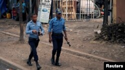 FILE - Police officers patrol along a road in Addis Ababa, Ethiopia February 21, 2018. (Reuters)