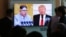 People watch a TV screen showing President Donald Trump, right, and North Korean leader Kim Jong Un during a news program at the Seoul Railway Station, April 21, 2018. North Korea said it has suspended nuclear and long-range missile tests and plans to close its nuclear test site.