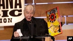 John Prine accepts the Album of the Year award at the Americana Honors & Awards show, Sept. 11, 2019, in Nashville, Tennessee.