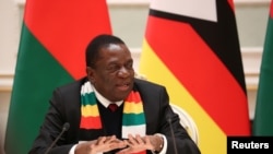 FILE - Zimbabwe's President Emmerson Mnangagwa speaks in Minsk, Belarus, Jan. 17, 2019. 
