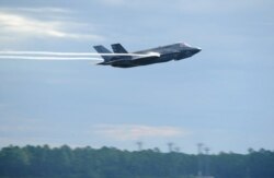 FILE - This Sept. 16, 2016 US Air Force handout photo shows a US Marine F-35 Lightning II taking off at Tyndall Air Force Base in Florida.