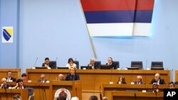 Valentina Matviyenko, speaker of the Federation Council, Russian parliament's upper chamber, center, addresses the Republic of Srpska Parliament in the Bosnian town of Banja Luka, Tuesday, April 24, 2018. Matviyenko is on a one day trip to meet with Republic of Srpska officials. 