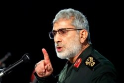 Gen. Esmail Ghaani, head of Iran's Quds Force, speaks during a ceremony marking the approaching anniversary of death of his predecessor, Qassem Soleimani, in Tehran, Iran, Jan. 1, 2021.