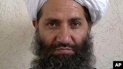 FILE -An undated photo in an unknown location shows the new leader of the Afghanistan Taliban Maulvi Haibatullah Akhunzadah posing for a portrait.