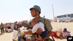 Syrian Official: Town Headed for 'Large-scale Massacre' 