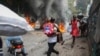 Protests Erupt Across Haiti as Demonstrators Demand That Prime Minister Resign