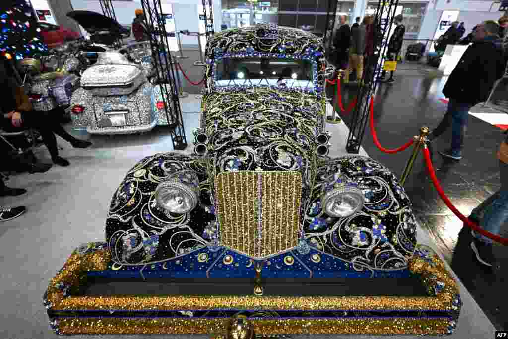 A vintage Citroen car decorated with gemstones is on display at the Essen Motor Show in Essen, western Germany.