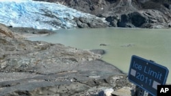 This May 9, 2020 file photo shows the Mendenhall Glacier in Juneau, Alaska. Since 2000, the glacier has lost 2.8 billion tons (2.5 billion metric tons) of snow and ice. (AP Photo/Becky Bohrer) 