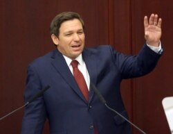 FILE- In this March 5, 2019 file photo, Florida Gov. Ron Desantis gives his state of the state address on the first day of the legislative session in Tallahassee, Fla. De Santis has pushed for a repeal to Florida's ban on smokable medical marijuana…