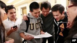 FILE - Supporters of Ed Lee cheered his 2011 election as the first Asian-American mayor of San Francisco, Calif. (AP Photo/Jeff Chiu)