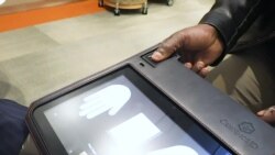 A Biometric ID: A Scan of the Iris or Fingerprint, to get Food, Medical Supplies