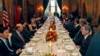 President Donald Trump and Chinese President Xi Jinping, with their wives, first lady Melania Trump and Chinese first lady Peng Liyuan are seated at the center, during a dinner at Mar-a-Lago in Palm Beach, Florida, April 6, 2017. 