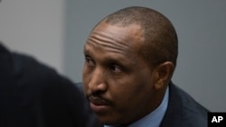 Congolese militia commander Bosco Ntaganda enters the courtroom of the International Criminal Court, or ICC, to hear the sentence in his trial in The Hague, Netherlands, Nov. 7, 2019.