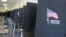 FILE - Voting booths are lined up in Albuquerque, New Mexico, Oct. 26, 2012. 
