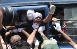 Indian police detain Indian activists as they protest against China in New Delhi, India, on June 17, 2020.