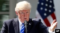 FILE - President Donald Trump speaks during a news conference in the Rose Garden of the White House, Sept. 26, 2017.