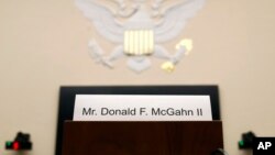 A placard is displayed for former White House Counsel Don McGahn, who did not appear before a House Judiciary Committee hearing, May 21, 2019, on Capitol Hill in Washington.