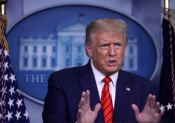 FILE - President Donald Trump responds to questions from members of the news media during a news conference at the White House in Washington, Aug. 31, 2020.