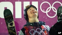 David Wise, of the United States, reacts to his score after competing in the men's ski halfpipe final at the Rosa Khutor Extreme Park, at the 2014 Winter Olympics, Feb. 18, 2014, in Krasnaya Polyana, Russia. Wise won the gold medal.