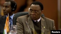 FILE - Niger's President Mamadou Tandja attends the plenary session of the Africa-South America Summit on Margarita Island.