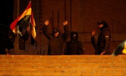 Police who are against the reelection of President Evo Morales protest in La Paz, Bolivia, Nov. 8, 2019.