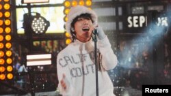 FILE - J-Hope performs in Times Square during New Year's Eve in New York, Dec. 31, 2022. 