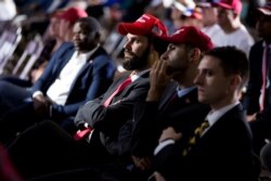 Fans of U.S. President Donald Trump watch a streaming of the first presidential debate between Trump and Democratic presidential nominee Joe Biden in Cleveland, Ohio, from Lititz, Pennsylvania, Sept. 29, 2020.