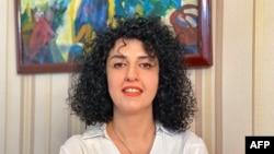 FILE - A handout photo provided by the Narges Mohammadi Foundation on October 2, 2023, shows an undated, unlocated photo of Iranian rights activist Narges Mohammadi.