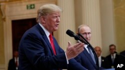 ফাইল ছবিঃ যুক্তরাষ্ট্রের প্রেসিডেন্ট ডনাল্ড ট্রাম্প ও রাশিয়ার প্রেসিডেন্ট ভ্লাদিমির পুতিন। 