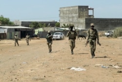 Members of the Amhara Special Force return to the Dansha Mechanized 5th division military base after fighting against the Tigray People’s Liberation Front, in Danasha, Amhara region near the border with Tigray, Ethiopia, Nov. 9, 2020.