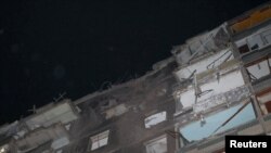 Зграда погодена од руски воздушен напад, во Харков, Украина, 28 октомври 2024 година.