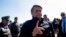 Brazil's president Jair Bolsonaro arrives at a hotel to participate in a news conference about the Amazon rainforest and to meet with Elon Musk, in Porto Feliz, Sao Paulo state, May 20, 2022. (Amanda Perobelli/Reuters)