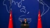 FILE - China's Foreign Ministry spokesman Hong Lei conducts a news conference in Beijing.