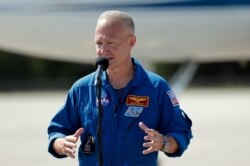 NASA astronaut Doug Hurley speaks at a news conference after he arrives at the Kennedy Space Center in Cape Canaveral, Fla., Wednesday, May 20, 2020.