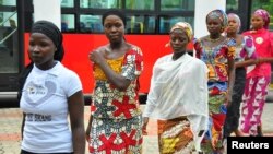Girls who escaped their Boko Haram captors arrive at presidential villa, Abuja, July 22, 2014.
