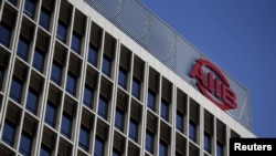 The logo of Asian Infrastructure Investment Bank (AIIB) is seen at its headquarter building in Beijing, Jan. 17, 2016.