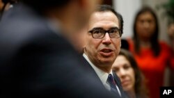 Treasury Secretary Steve Mnuchin speaks during a meeting with President Donald Trump on the "Foreign Investment Risk Review Modernization Act" in the Roosevelt Room of the White House, Aug. 23, 2018, in Washington.