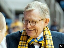 FILE - WVU President Gordon Gee during a basketball game in 2014. (AP Photo/Andrew Ferguson)