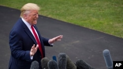 FILE - President Donald Trump speaks with reporters before departing from the South Lawn of the White House, in Washington, Sept. 9, 2019.