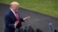 FILE - In this Sept. 9, 2019 file photo, President Donald Trump speaks with reporters before departing on Marine One from the South Lawn of the White House, in Washington.