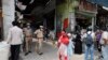 India Cautiously Reopens Neighborhood Stores Shuttered by COVID