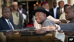 FILE - Nigerian President Goodluck Jonathan (C) getting into his vehicle in Abuja.