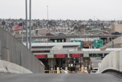 Digital signs signal closed at an international bridge checkpoint at the U.S-Mexico border that joins Ciudad Juarez and El Paso, March 21, 2020.