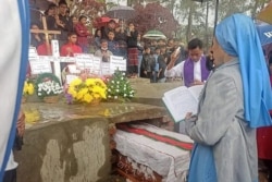 Mourners attending the funeral, April 29, 2021, of Felix Thang Muan Lian, a night security guard at a gas station who was shot by security forces on his way to work in Dedin in western Myanmar's Chin state. (Credit: Chin World)