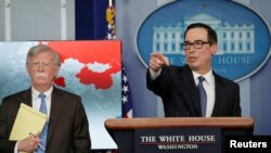 លោក​រដ្ឋមន្ត្រី​រតនាគារ​ជាតិ Steven Mnuchin (រូប​ស្តា) ប្រកាស​ពី​ការ​ដាក់​ទណ្ឌកម្ម​សេដ្ឋកិច្ច​ប្រឆាំង​នឹង​ក្រុមហ៊ុន PDVSA របស់​វ៉េណេស៊ុយអេឡា កាលពី​ថ្ងៃទី២៨ ខែមករា ឆ្នាំ២០១៩។