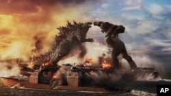 This image released by Warner Bros. Entertainment shows a scene from "Godzilla vs. Kong." (Warner Bros. Entertainment via AP)
