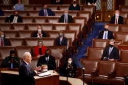 U.S. President Joe Biden delivers his first address to a joint session of the U.S. Congress at the U.S. Capitol in Washington, April 29, 2021.